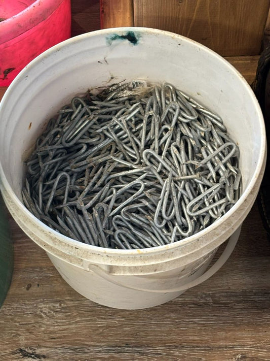 Bucket of fencing nails